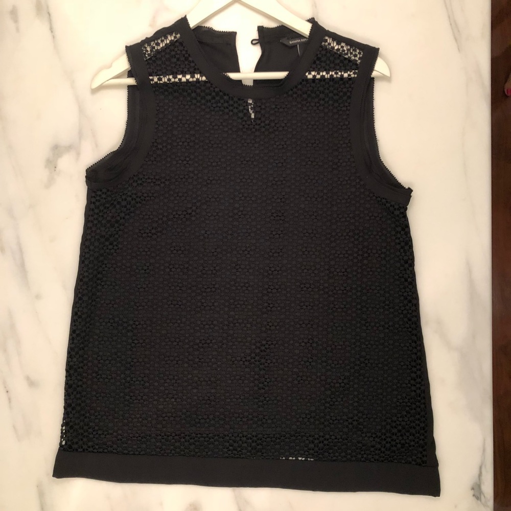 Lovely black peek-a-boo sleeveless top